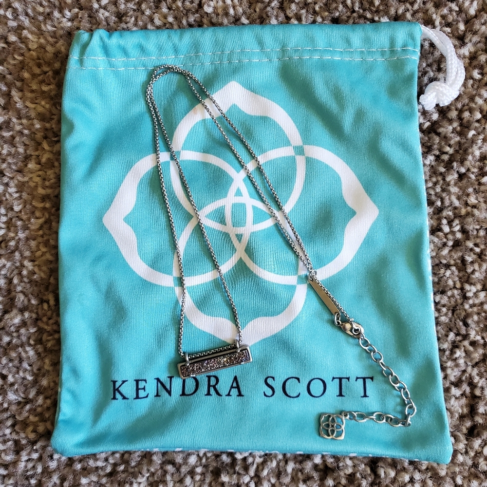 Kendra Scott purple, green and blue necklace.